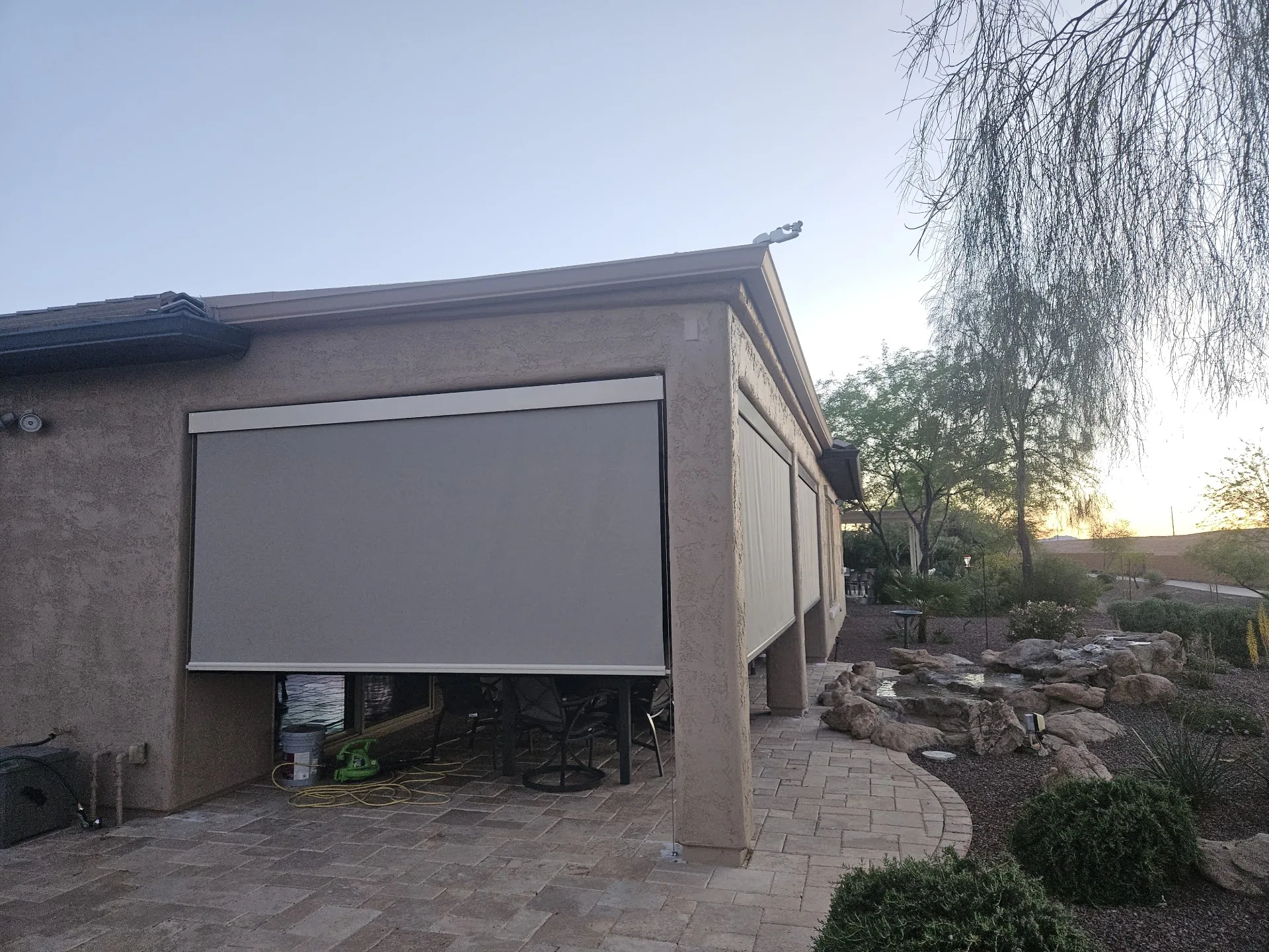 Exterior solar screen installed by A to Z Shades and Shutters in Mesa, AZ, serving the Phoenix metro area (project photo screens cabled 17)
