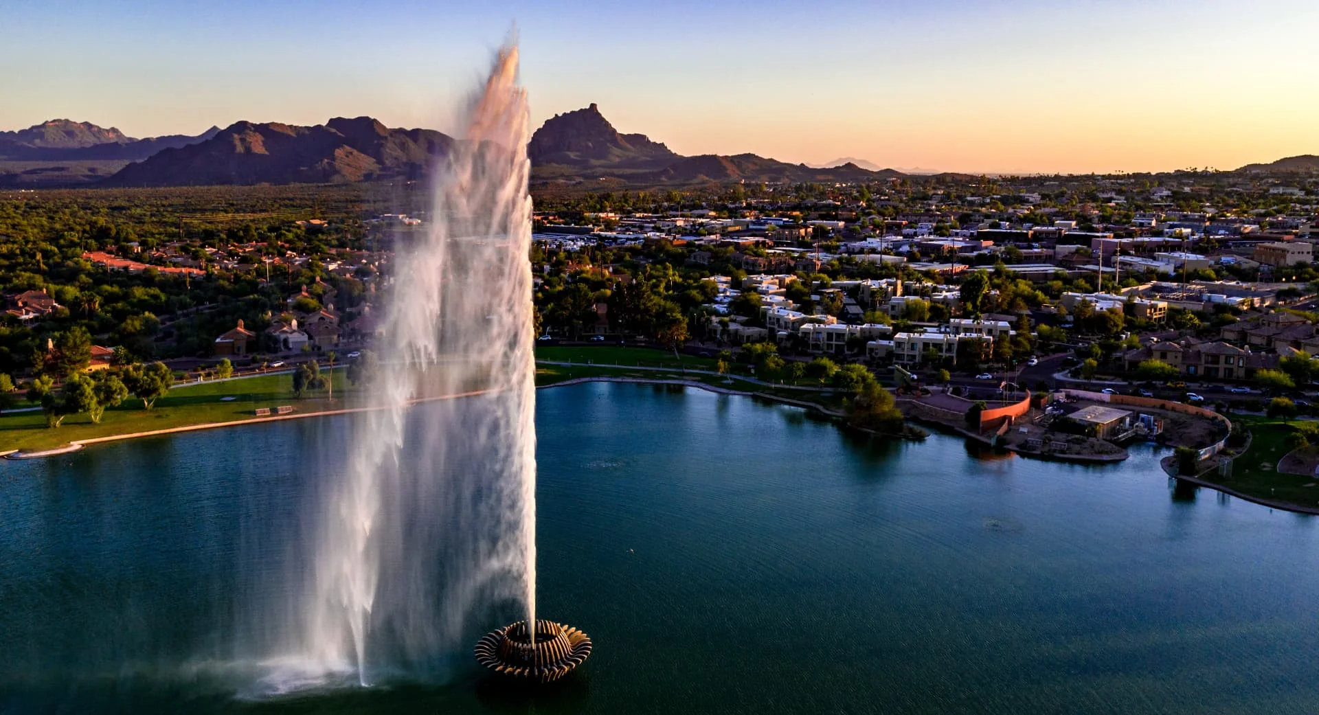 The fountain over the lake in Fountain Hills, Arizona at sunset