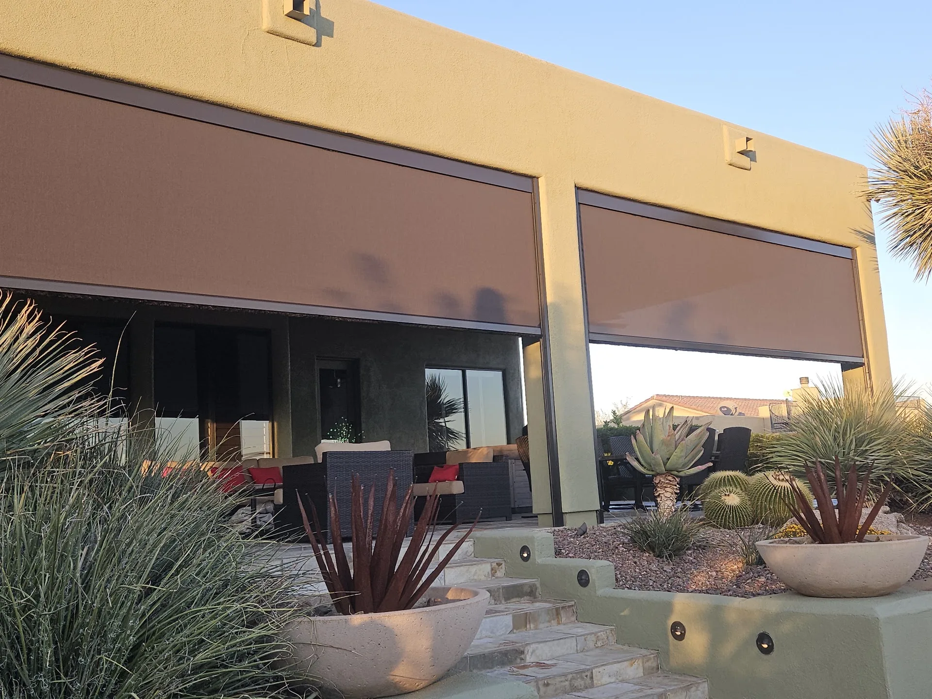 Roll down exterior shade installed on a residential patio