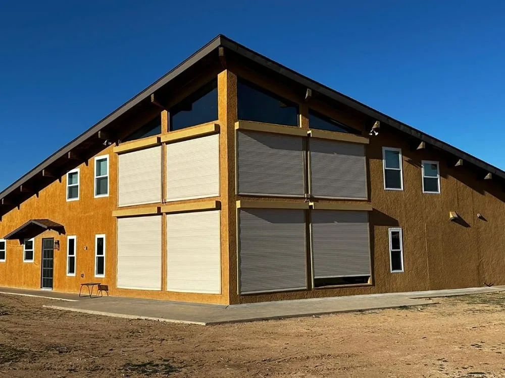 Security shutters installed across a wide exterior opening