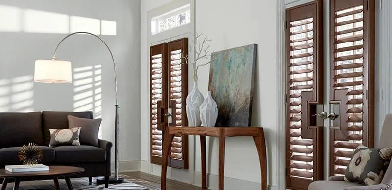 Shade and shutter design consultation with a homeowner