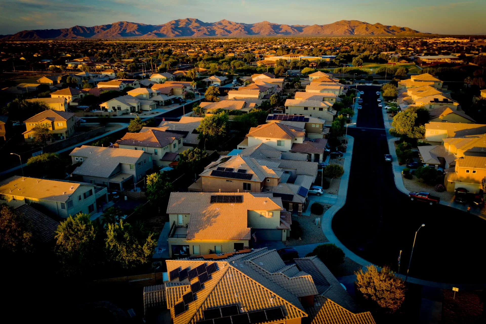 Surprise, Arizona neighborhood at golden hour with the White Tank Mountains