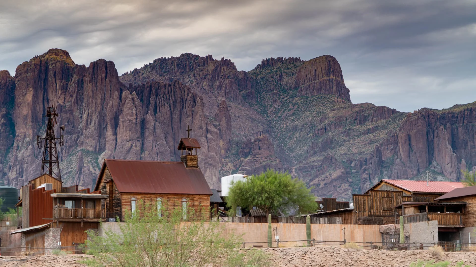 Rustic buildings beneath the Superstition Mountains in Apache Junction, Arizona