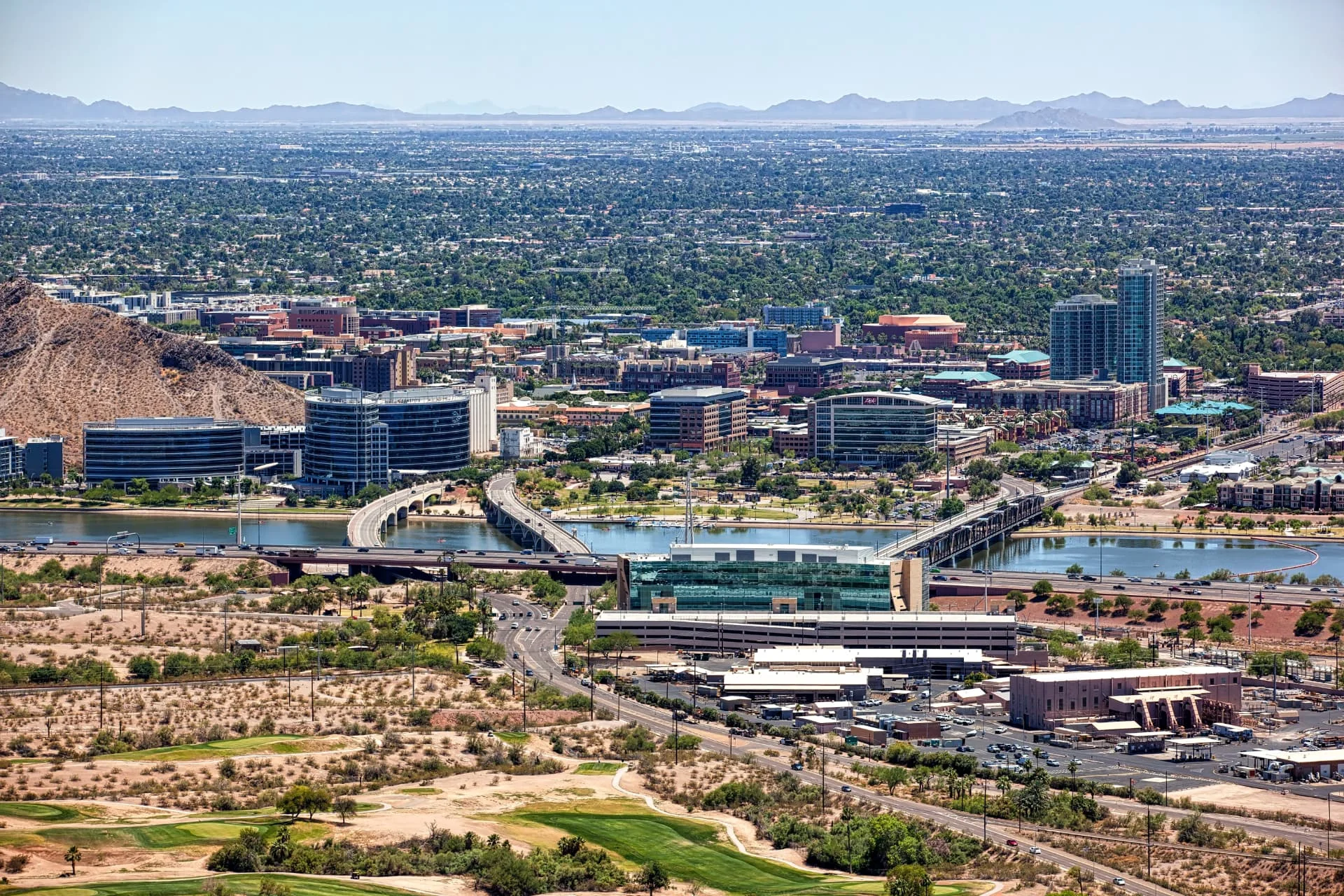 Tempe, Arizona skyline above Tempe Town Lake and the Mill Avenue bridges