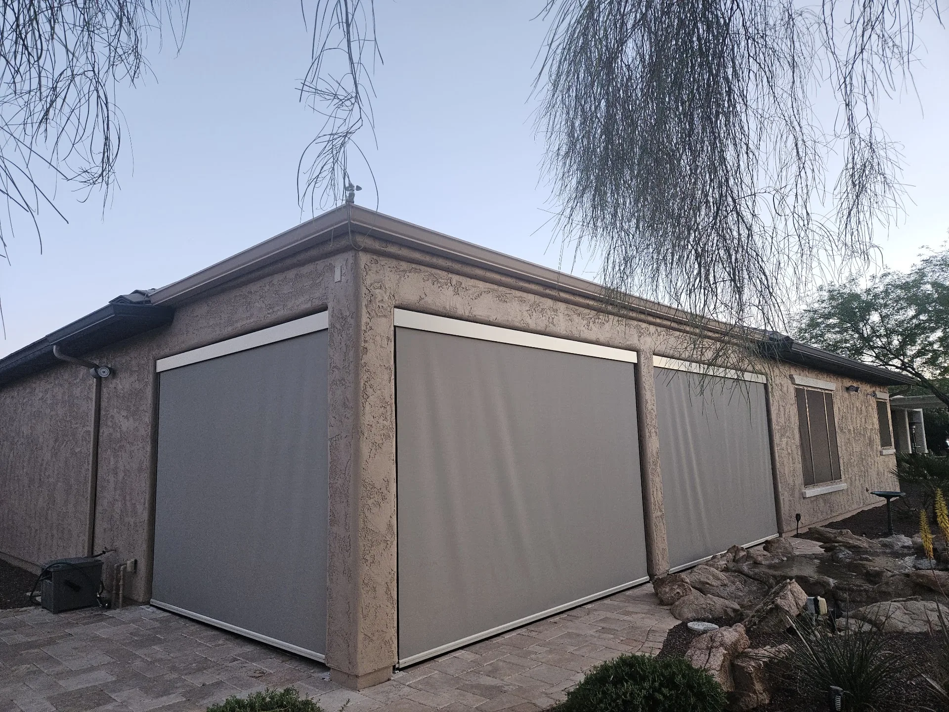 Exterior solar screen installed by A to Z Shades and Shutters in Mesa, AZ, serving the Phoenix metro area (project photo screens cabled 18)