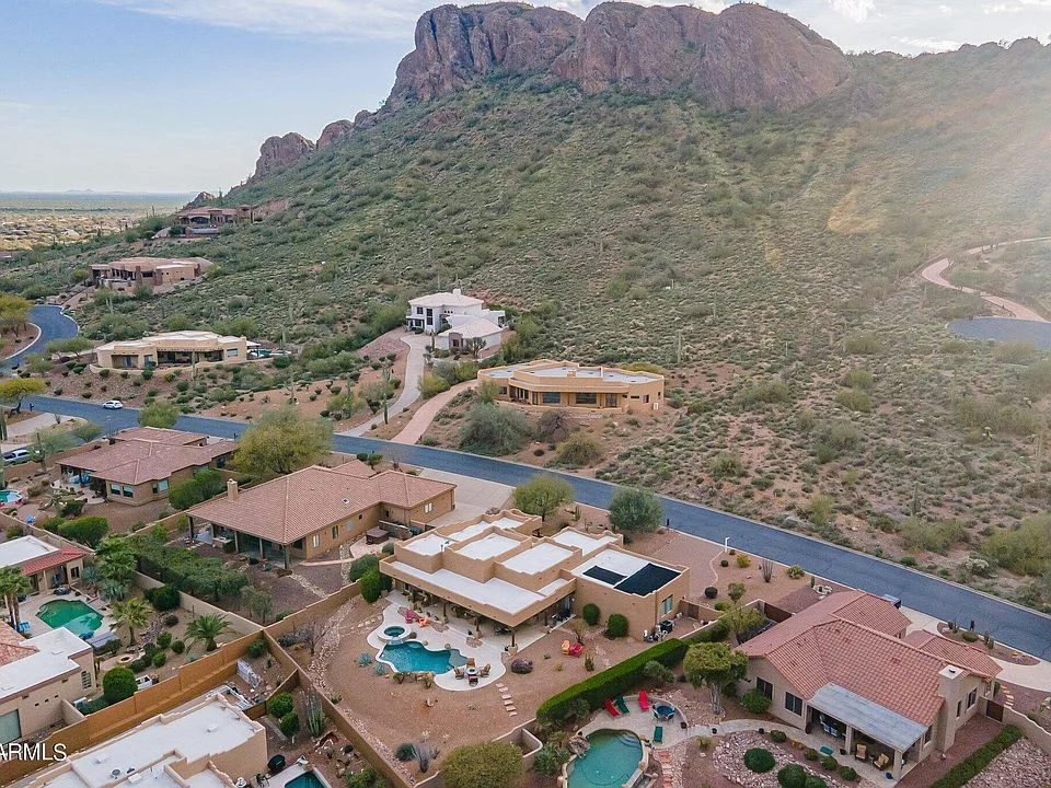 Hillside homes below a desert mountain in Gold Canyon, Arizona