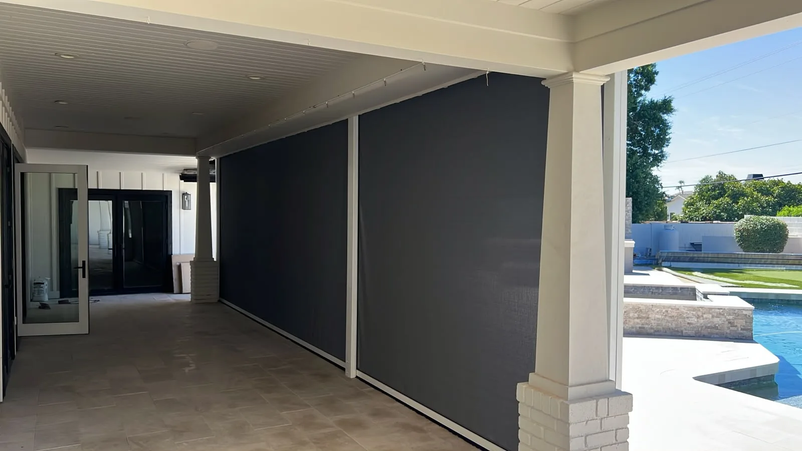 Exterior solar screen installed by A to Z Shades and Shutters in Mesa, AZ, serving the Phoenix metro area (project photo screens track 48)