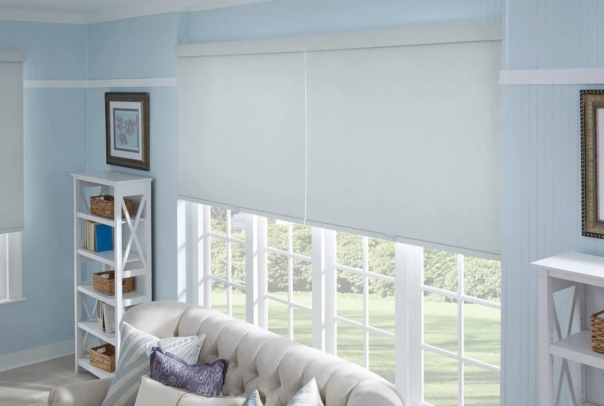 Light filtering shades in a bright living room