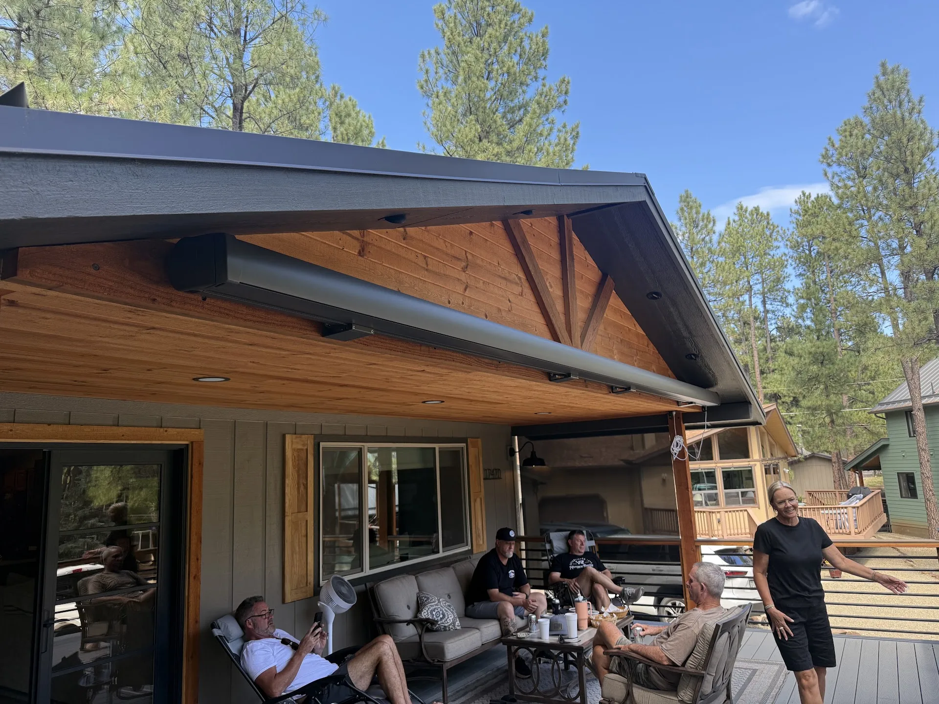 Retractable patio awning installed along the back of an Arizona house