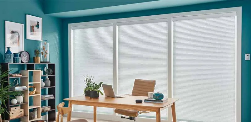 Sheer shades layered behind drapery